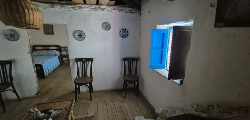 Casa de pueblo de cinco habitaciones para reformar