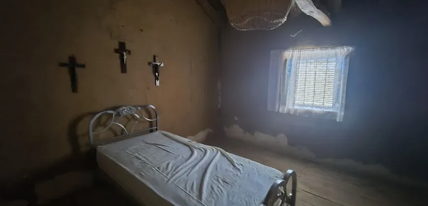 Casa de pueblo de cinco habitaciones para reformar