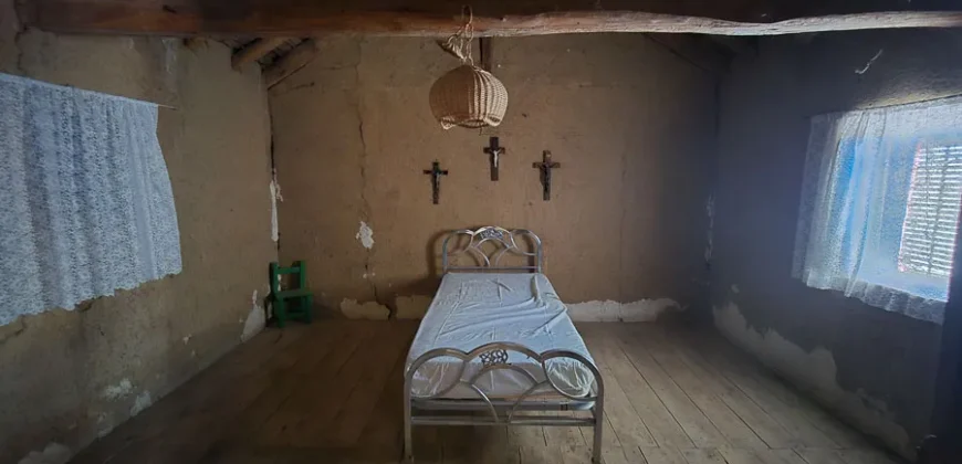 Casa de pueblo de cinco habitaciones para reformar