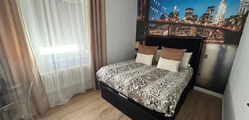 Piso de diseño con tres habitaciones y dos baños