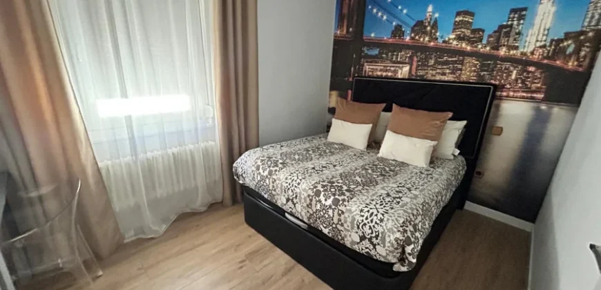 Piso de diseño con tres habitaciones y dos baños