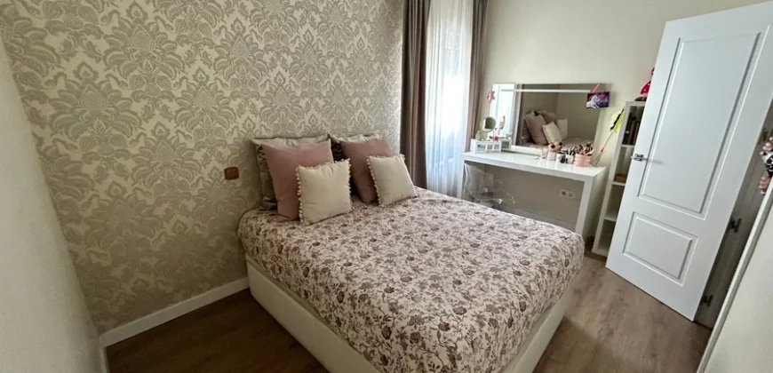 Piso de diseño con tres habitaciones y dos baños