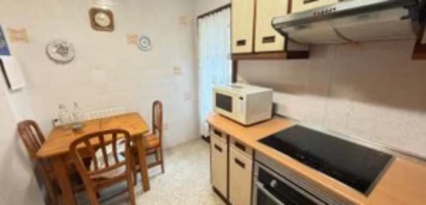 Piso de tres habitaciones con garaje