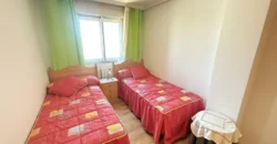 Piso reformado de tres habitaciones y dos baños con garaje