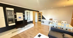 Piso reformado de tres habitaciones y dos baños con garaje