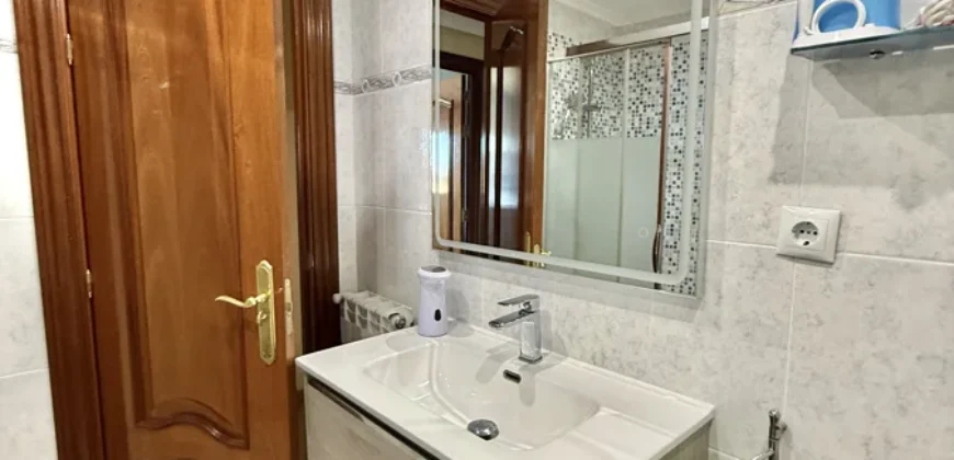 Piso de tres habitaciones y dos baños