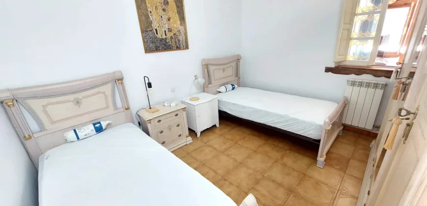 Casa rustica de tres habitaciones con patio